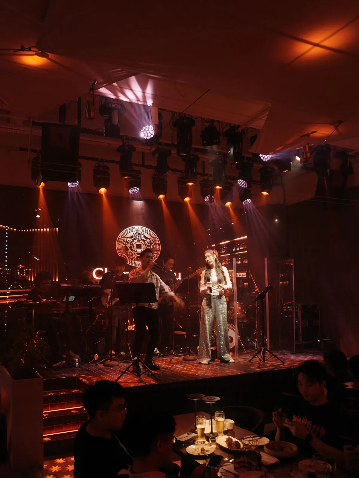 Live band performing on stage at Char Mu Mu